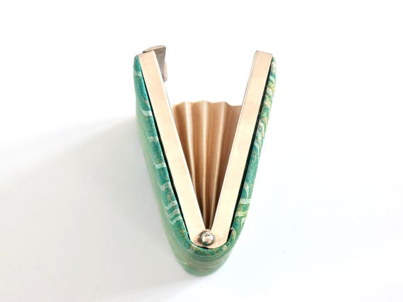 Japanese Silk Clutch | Geometric Pattern side view highlighting the expandable accordion gusset and silver frame