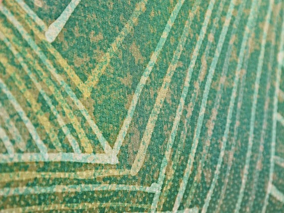 Japanese Silk Clutch | Geometric Pattern close up view of the textured green fabric and painterly stencil lines