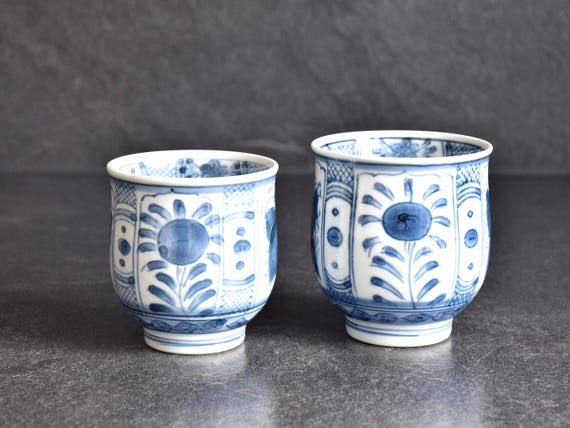 Arita Ware Yunomi Cups pair of blue and white ceramic tea cups displayed together