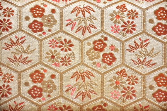 Hexagonal Floral Kimono Clutch pattern detail showing gold background and floral motifs