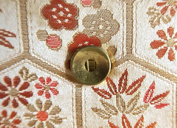 Hexagonal Floral Kimono Clutch close up of the metal clasp hardware