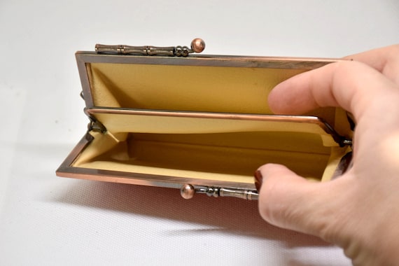 Kaga Yuzen Silk Coin Purse open view showing the soft yellow fabric lining and central divider compartment