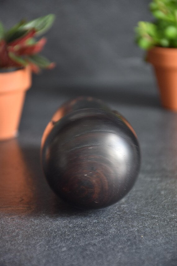 Usaburo Creative Kokeshi Doll top view of the rounded dark wood head showing wood grain
