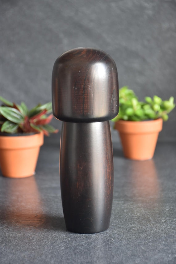 Usaburo Creative Kokeshi Doll rear three-quarter angle showcasing the rounded wooden head
