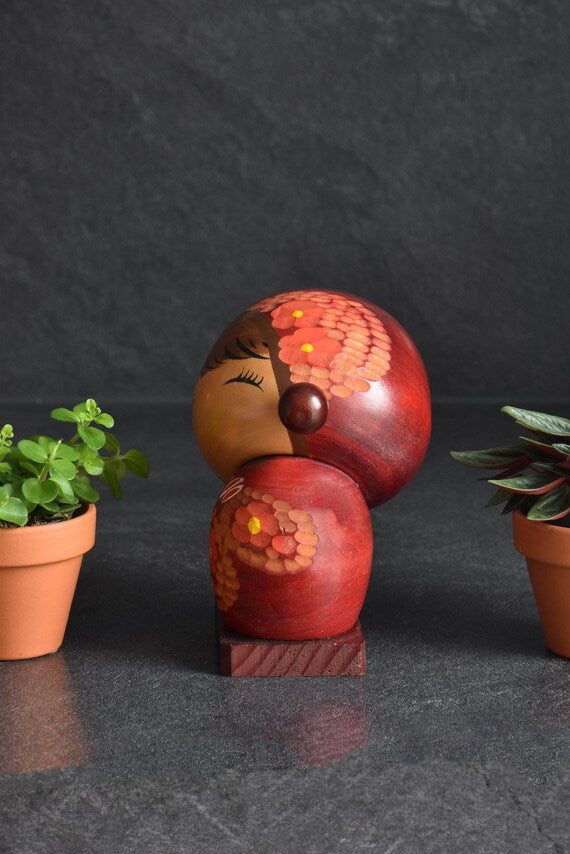 Chie Tamura Pigtail Kokeshi Doll side profile showing the painted pigtail knob and hair pattern