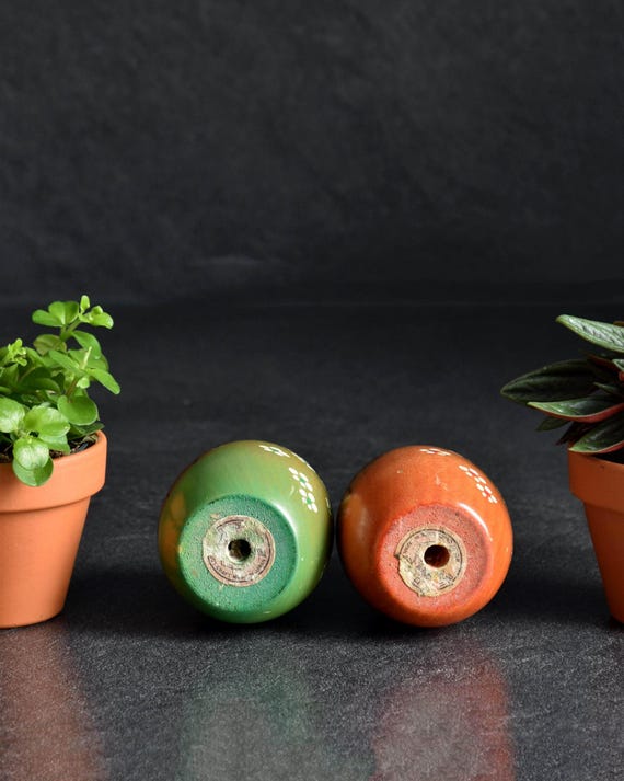 Usaburo Creative Kokeshi Pair base showing workshop signatures and maker sticker details