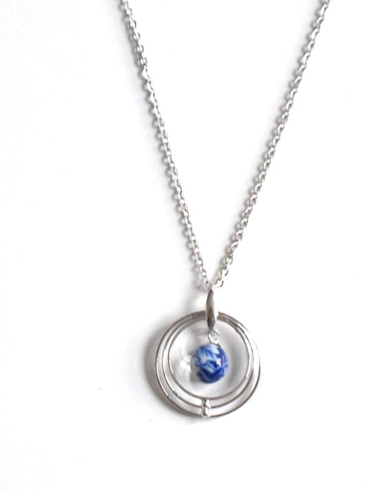 Kiyomizu-yaki Blue Floral Pendant Necklace detail view of the porcelain bead and rings