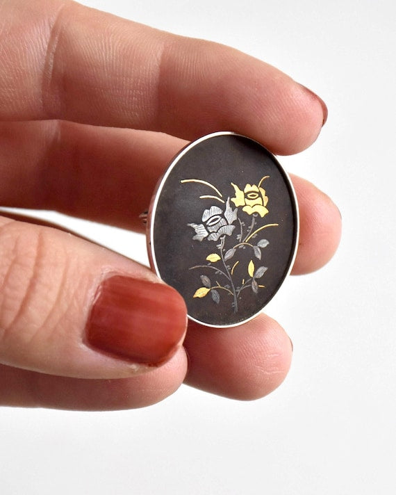 Amita Black Gold Damascene Floral Brooch and lapel pin with Zogan metal inlay