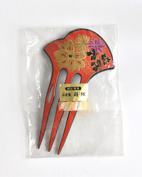 Japanese Red Lacquer Fork hair comb in original plastic packaging with gold sticker