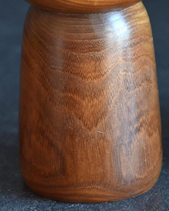 Kazuo Takamizawa kokeshi doll close up of the natural wood grain texture on the body