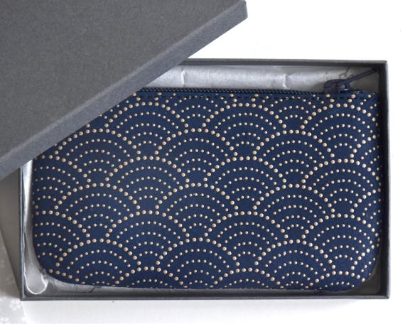 Japanese Deerskin Urushi Pouch coin purse shown inside its original grey box with information leaflet