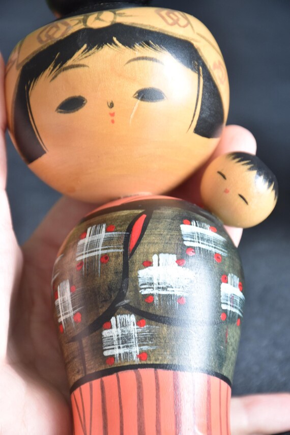 Hajime Miyashita Oshin Lullaby Kokeshi close up of painted face and kimono detail