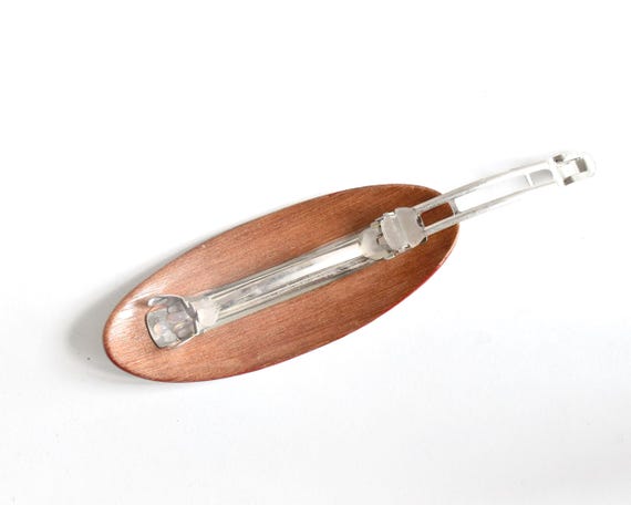 Maki-E Red Oval Barrette With Gold Floral showing the back wooden reverse side with attached metal clasp