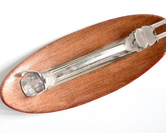 Maki-E Red Oval Barrette With Gold Floral close-up view focusing on the metal clasp mechanism on the back