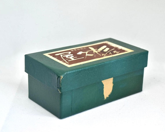 Yakusugi Cedar Sake Cups original green storage box showing the decorative label on top
