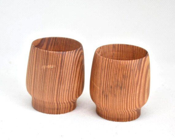 Yakusugi Cedar Sake Cups pair viewed from the front highlighting the tight resin-rich grain