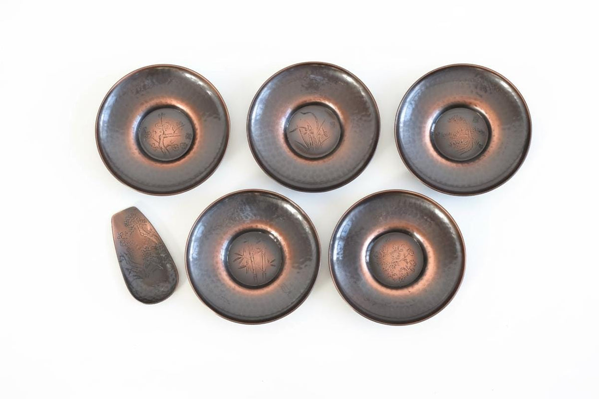Shochikubai Hammered Copper Chataku Tea Set top down layout of five engraved copper saucers and a scoop