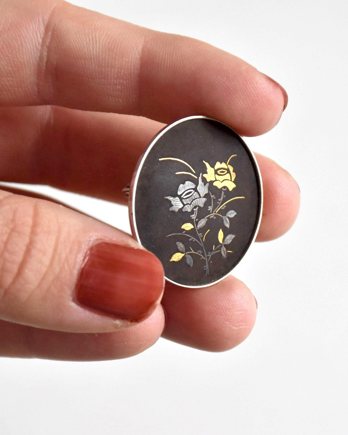 Amita Black Gold Damascene Floral Brooch and lapel pin with Zogan metal inlay
