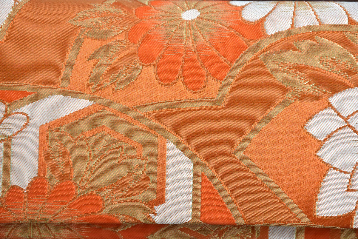 Saga Nishiki brocade clutch handbag detailed view of the traditional Japanese brocade fabric texture.