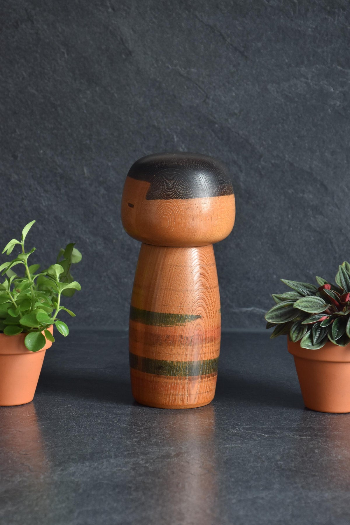 Sanpei Yamanaka Sosaku Kokeshi doll front view showing facial expression and wood grain