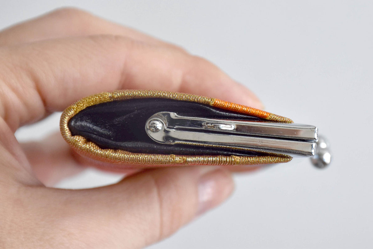 Nishijin-Ori Silk Gamaguchi Coin Purse side profile in hand