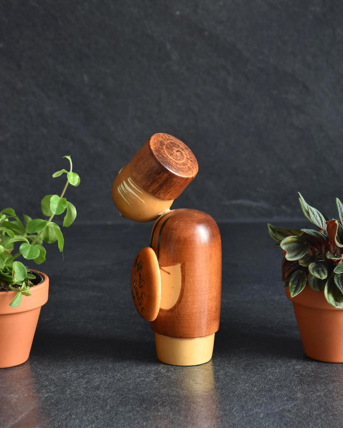 Hajime Miyashita Creative Kokeshi Matsuo Basho showing the left side profile and rounded wooden hat