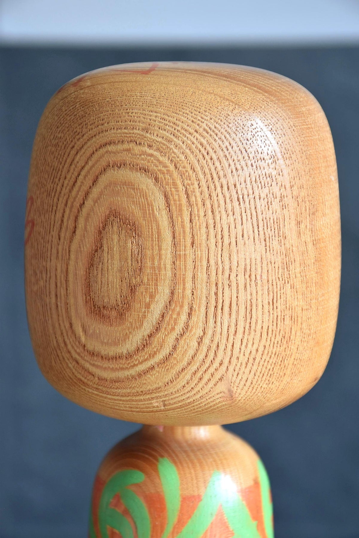 Issetsu Kuribayashi sosaku kokeshi pair Mugen Arabesque head detail showing wood grain
