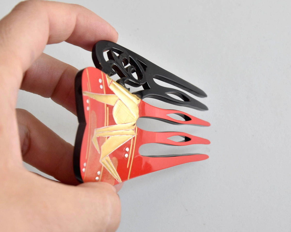 Kanzashi Hair Comb Origami Crane Red And Black Lacquer held in hand showing thickness and crest