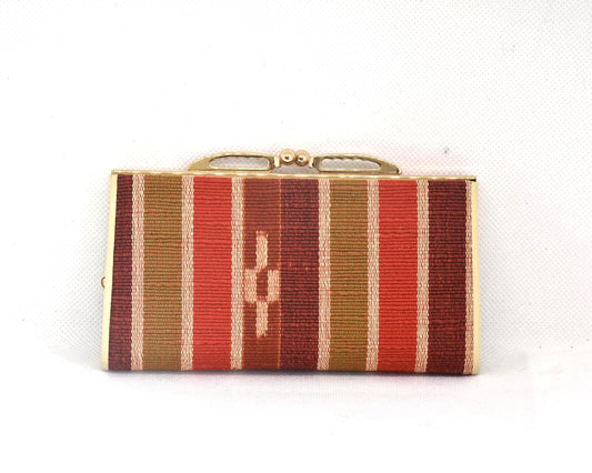 Yaeyama Minsa-Ori coin purse showing the handwoven cotton red, ochre, and off-white striped pattern