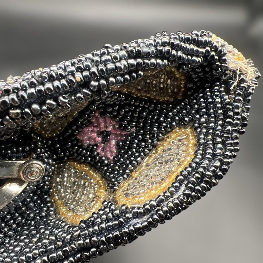 Japanese beaded handbag corner and side construction showing durable bead stitching
