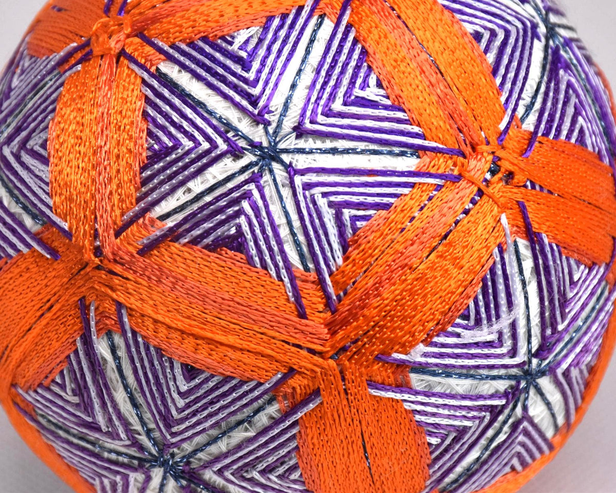 Hand-Embroidered Temari Ball Orange And Purple table scatter close up of the pattern detail