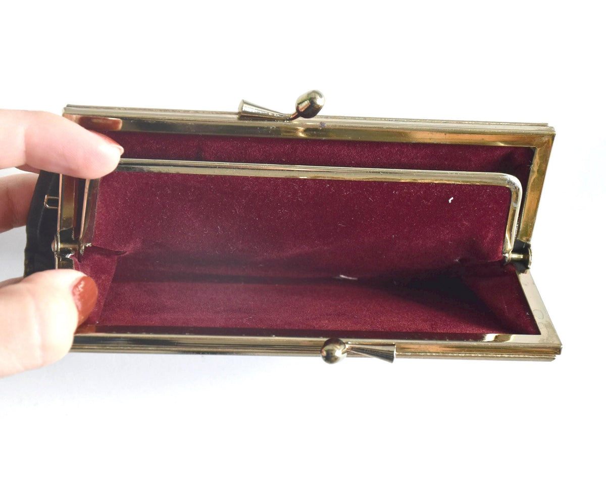 Green Oshima Tsumugi Silk Gamaguchi Coin Purse fully opened interior with burgundy fabric.