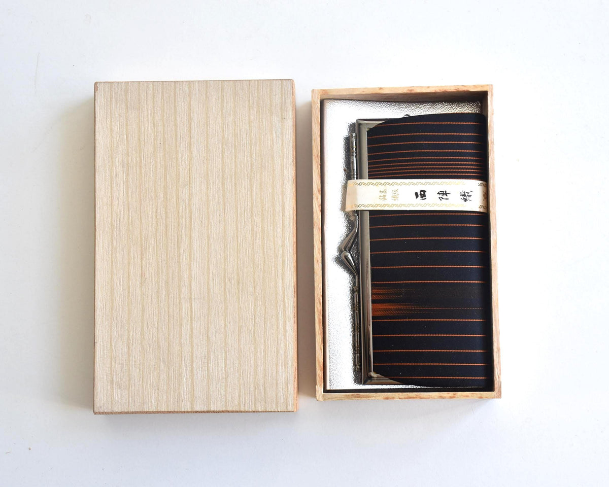 Nishijin-Ori Silk Gamaguchi Purse Black Copper Stripe stored inside original paulownia box