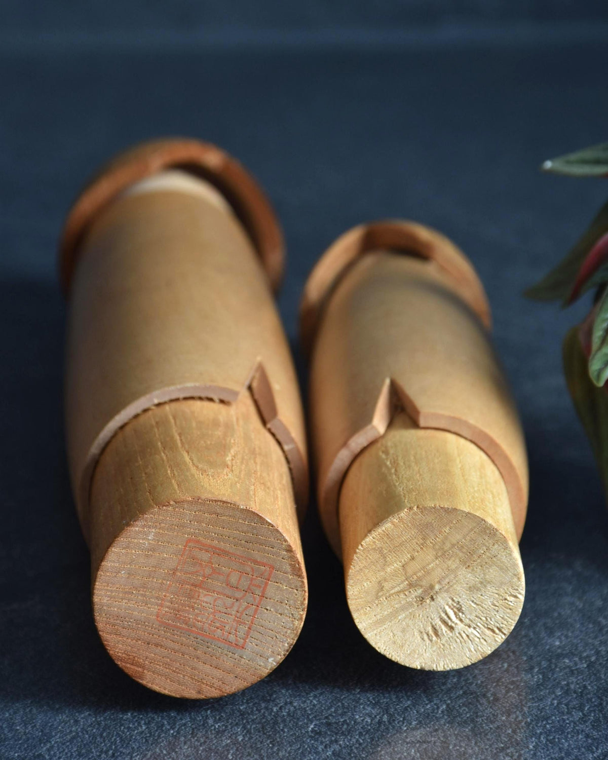 Shido Shozan kokeshi pair bases viewed from below
