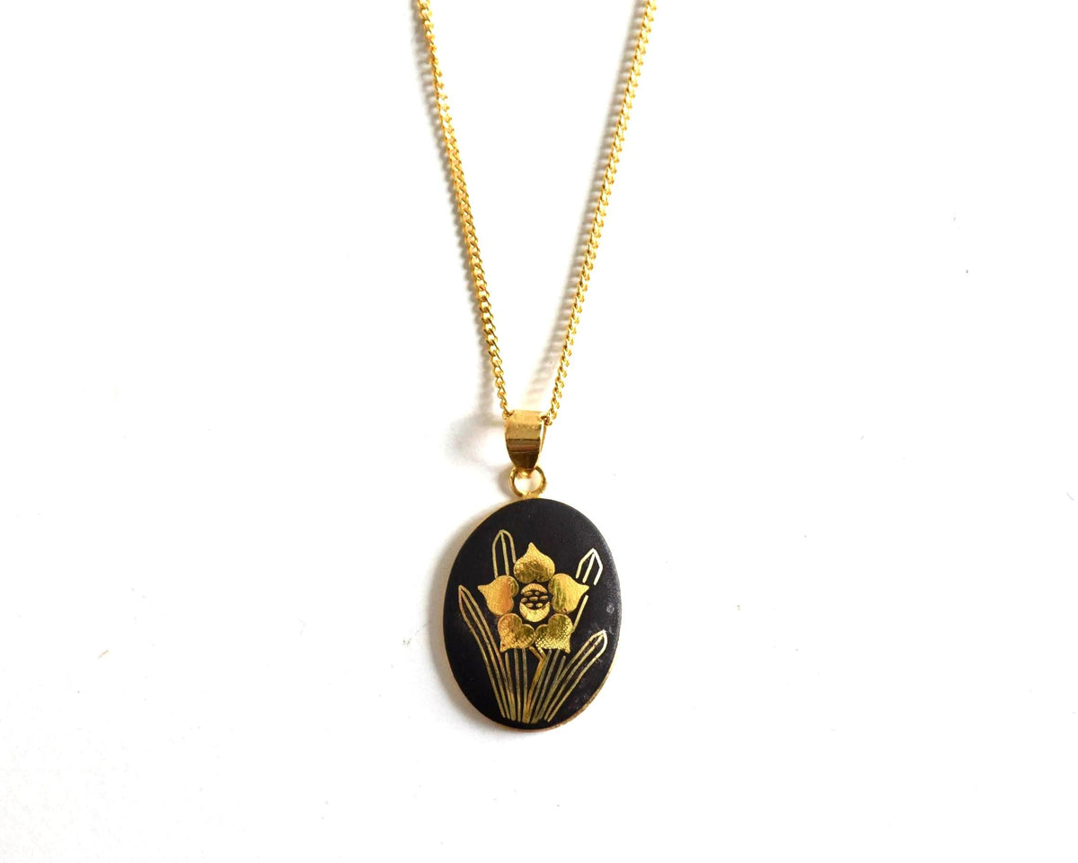 Japanese Zogan floral pendant necklace showing the gold inlaid flower pattern