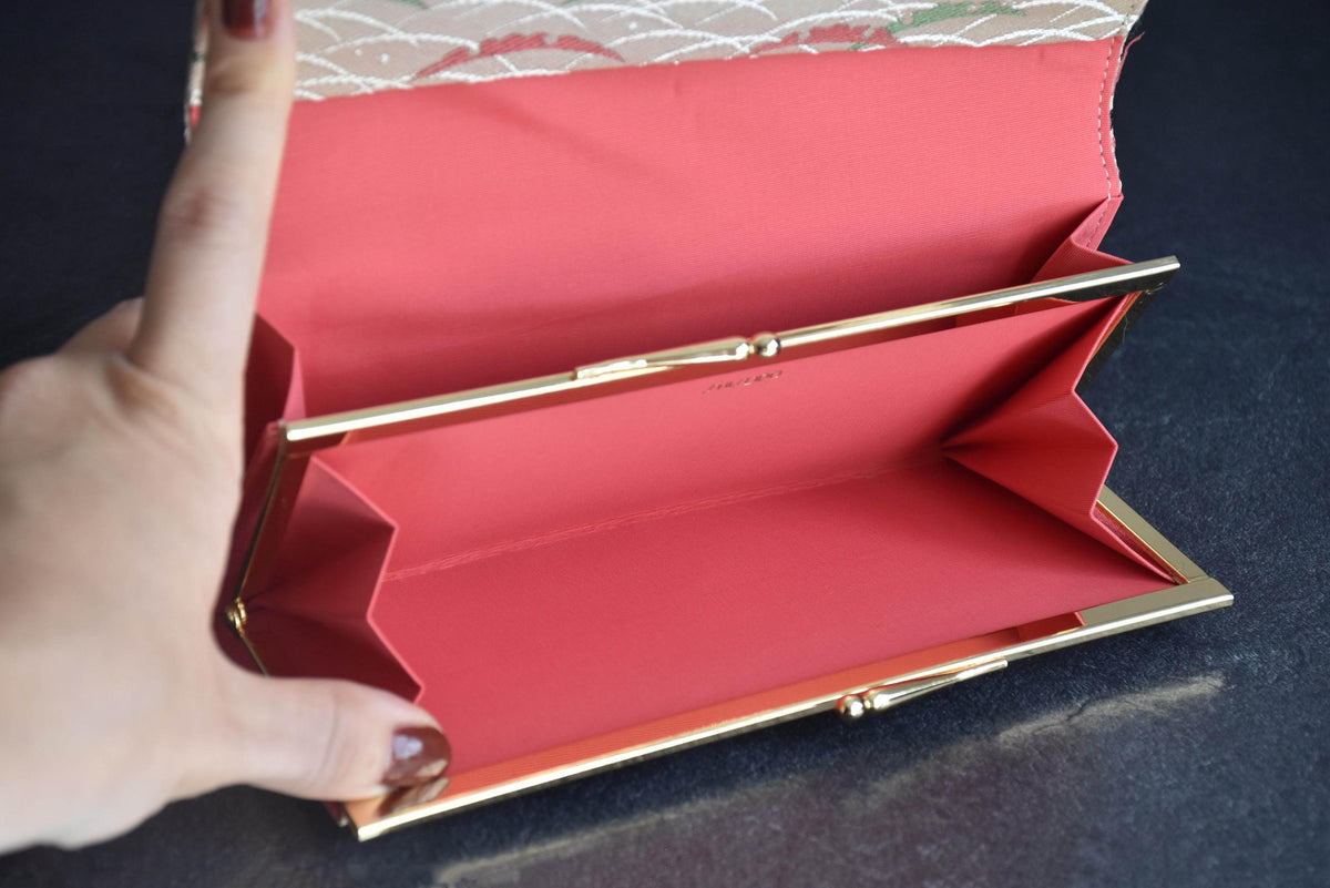 Shiseido Japanese Kimono Clutch With Traditional Weaves opened interior and kiss-lock coin purse