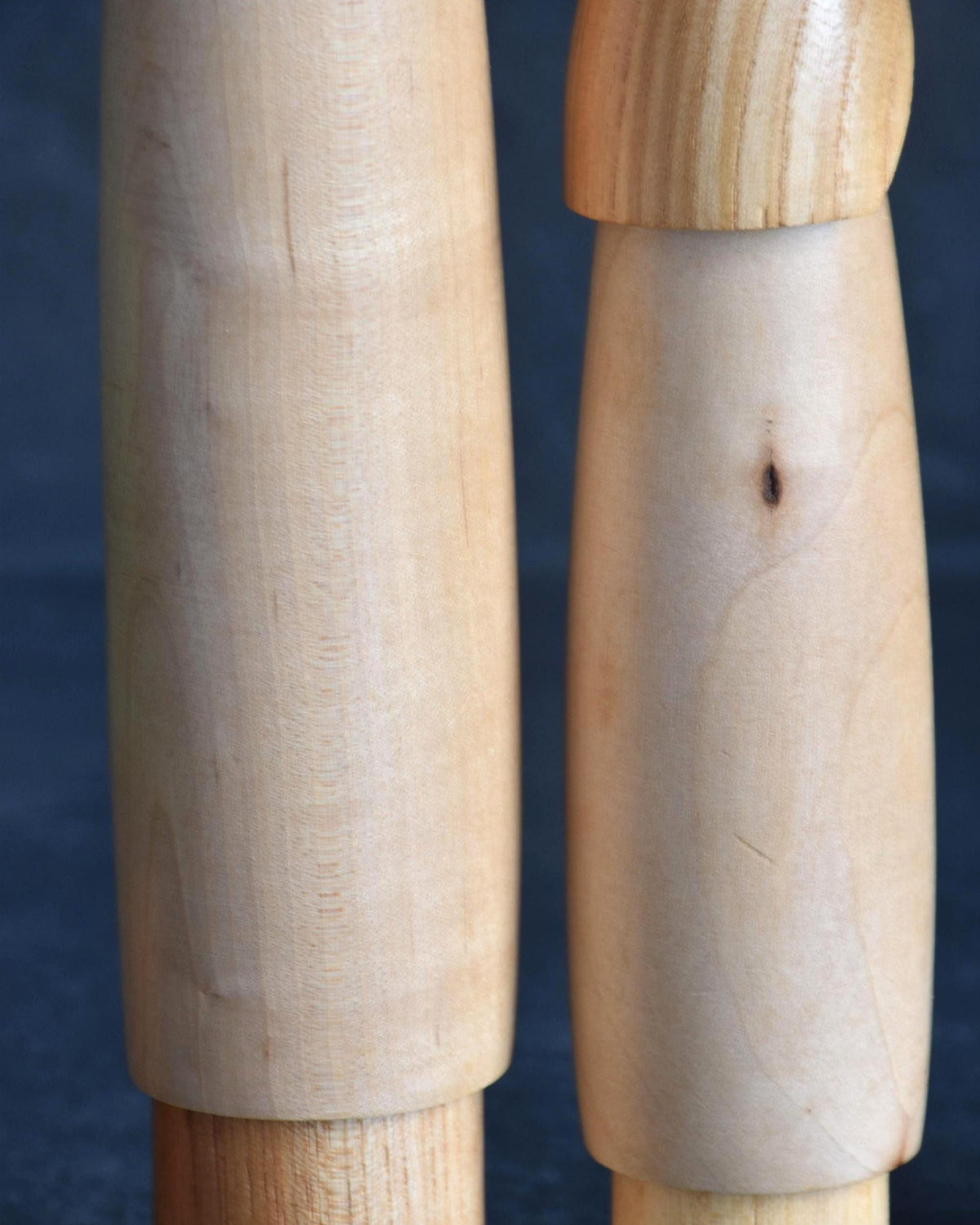 Shido Shozan kokeshi pair surface texture and grain detail