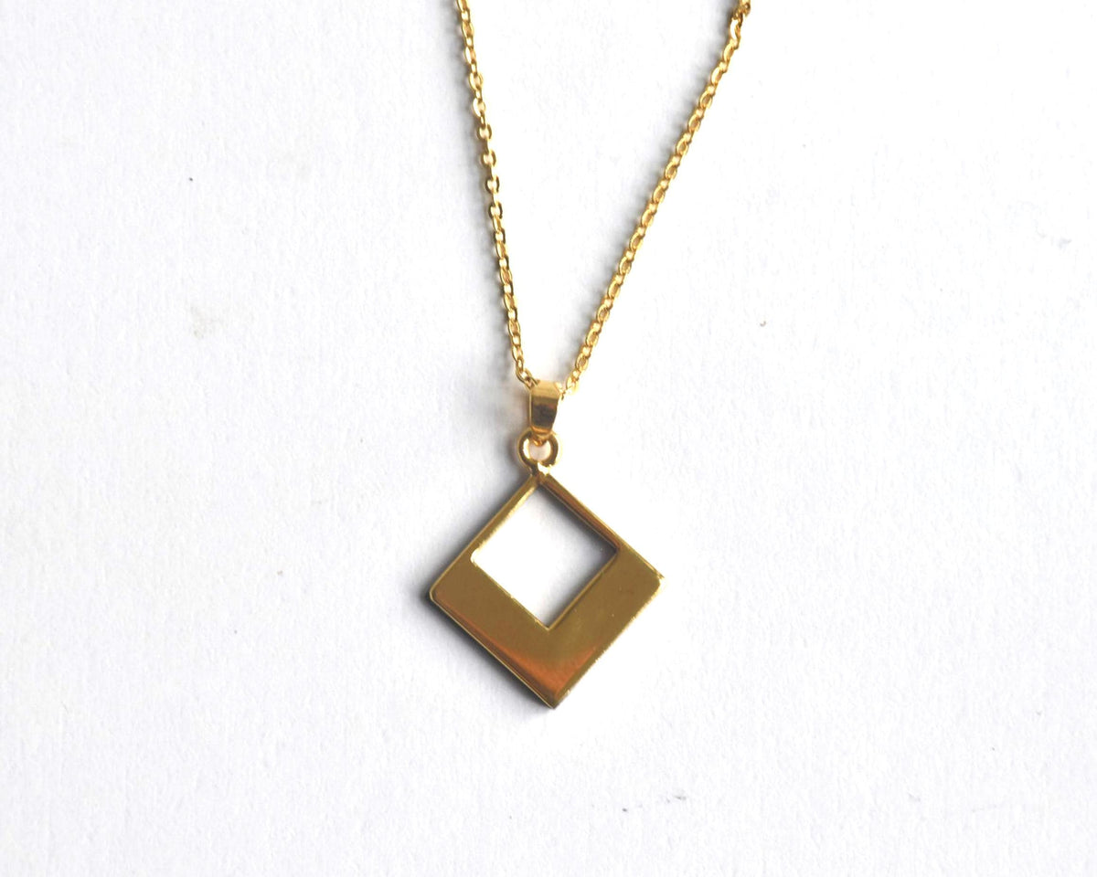 Floral Zogan Damascene Inlay Gold Necklace hanging pendant viewed from a slight angle