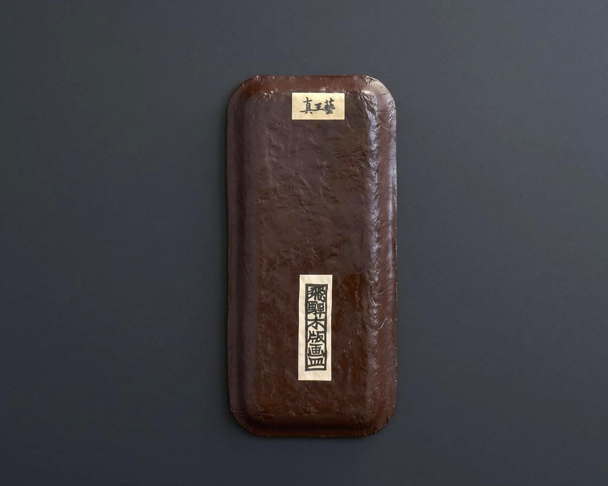 Ikkanbari Papier-Mache Serving Tray back showing textured brown base and labels