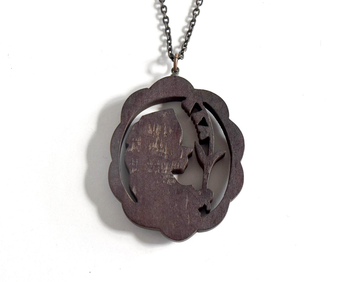 Ainu wooden pendant necklace reverse view showing the full chain and pendant