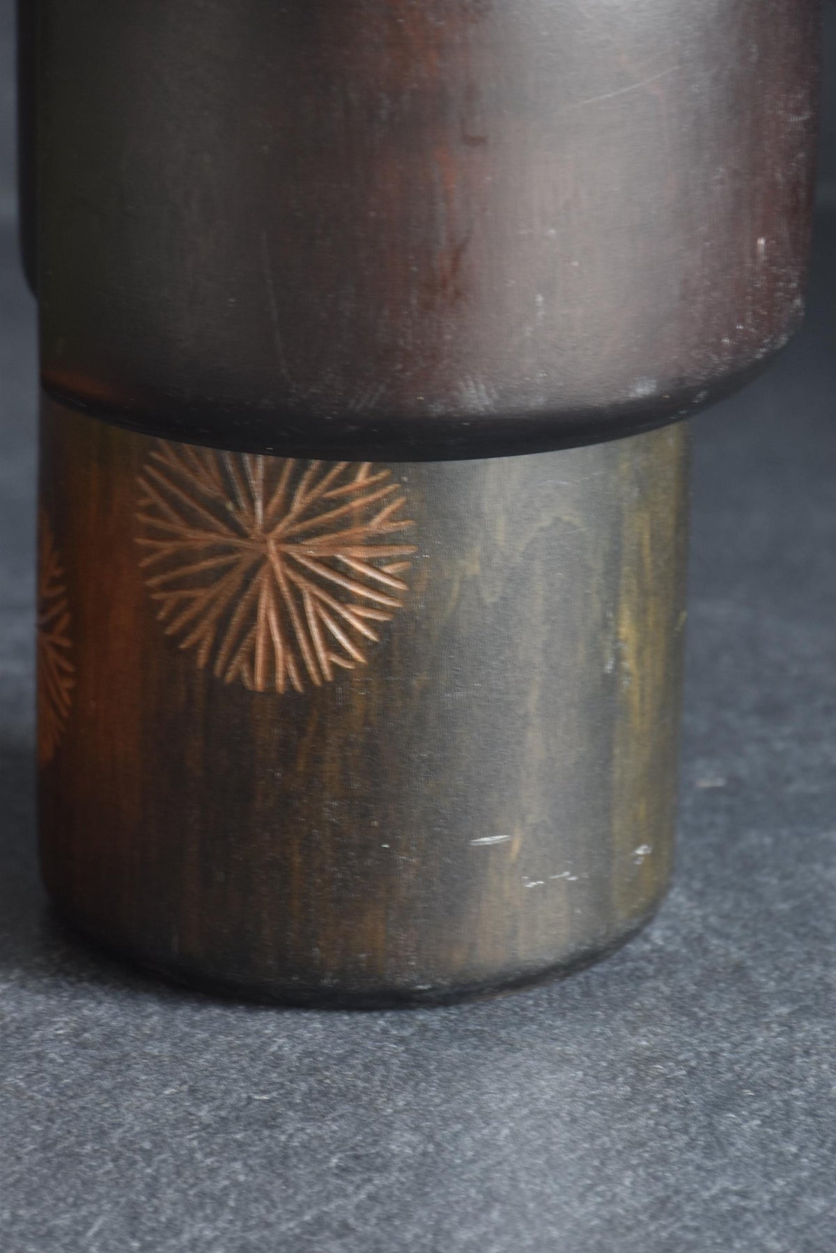 Sansaku Sekiguchi sosaku kokeshi doll, pattern detail showing carved starburst motifs