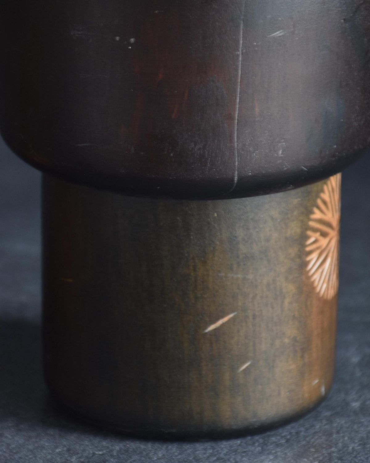 Sansaku Sekiguchi sosaku kokeshi doll, close up of body wood grain and surface scratches