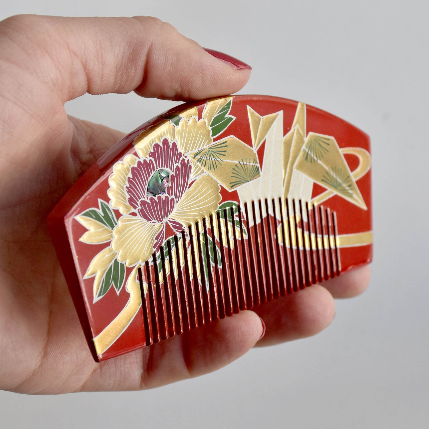 Traditional Kanzashi hair ornaments, combs, and hair sticks for kimono styling and formal Japanese attire.