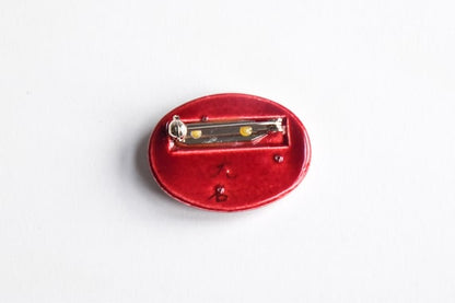 Kutani Dark Red Ceramic Brooch back view showing the secure metal pin and glossy glazed ceramic reverse side