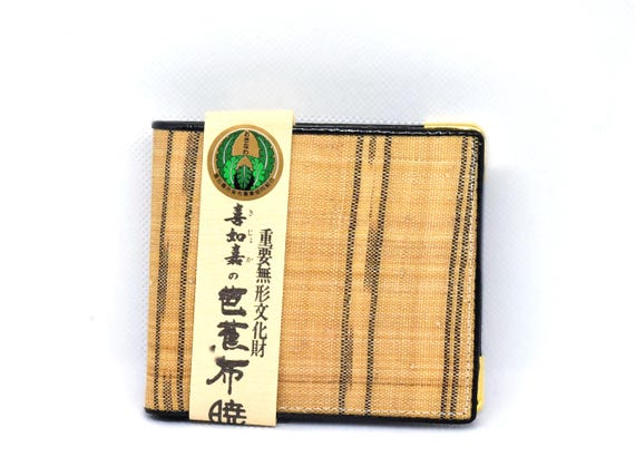 Bashofu banana fiber purse with paper label attached to the front