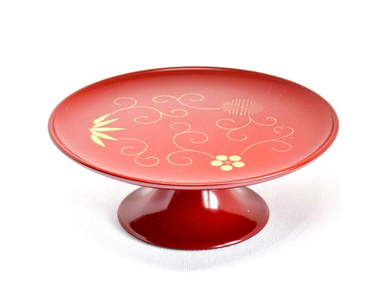 Red Lacquer Pedestal Plate With Gold Motif