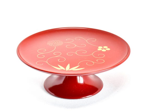 Red Lacquer Pedestal Plate With Gold Motif