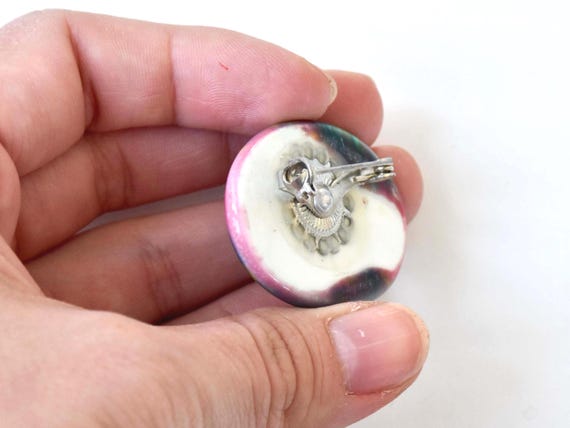Kutani Pink & Green Ceramic Brooch back clasp shown closely held in hand