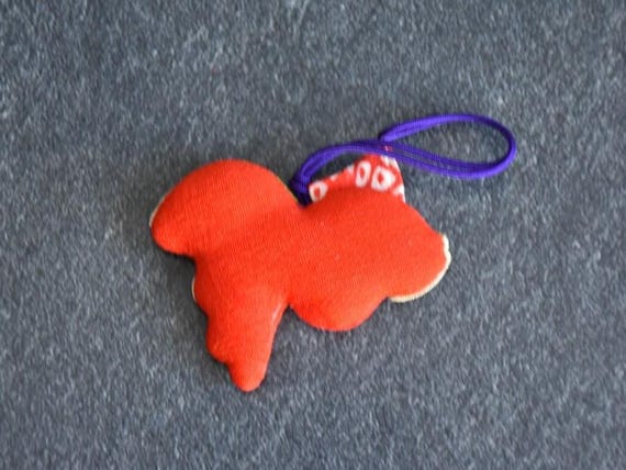 Chirimen Silk Goldfish Charm back view showing plain red fabric and purple hanging cord