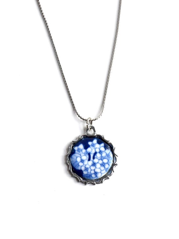 Kiyomizu-yaki Blue Floral Pendant Necklace featuring a blue and white porcelain design